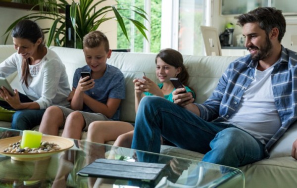 family-using-devices